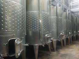 Les flotteurs, deux types de chapeaux flottants pour garde de vin en acier inox La Naissance D Un Millesime Dans Le Chai