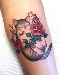 Sleeping Cat With Rose Done At Thepiercingurge Today Tattoos Kitten Tattoo Body Art Tattoos