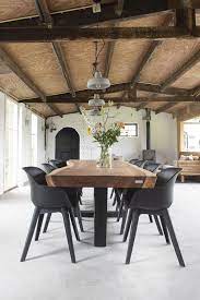 boomstamtafel staal houten tafel eetkamer idee eetkamertafel