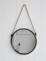 Make the five straps for the mirror frame out of thin rope: Porthole Round Mirror Hanging With Rope For Coastal Nautical Home Interiors