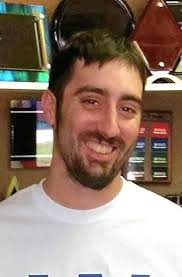 Could someone please edit the background to have him standing in the woods?