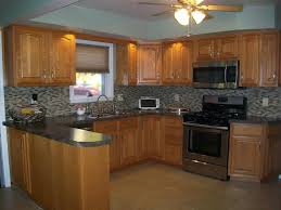 Honey oak kitchen cabinets are one of the most common kitchen cabinets you'll find in homes. Honey Oak Cabinets Kitchen Novocom Top