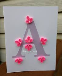 Next, we will be decorating the front cover with the help of quilling art. Trupti S Craft Paper Quilling Monogram Greeting Card Wall Frame Home Decor Office Decor