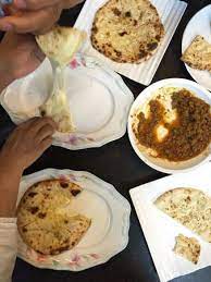 Not skimpy, but definitely not overpowering. Cheese Naan Garlic Naan Beef Keema Picture Of Rsmy Kuala Lumpur Tripadvisor