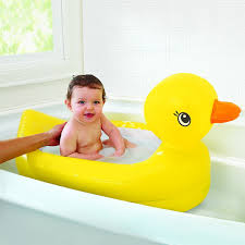 Make the bath water comfortably warm (90 to 100 degrees f). White Hot Duck Bath Toy With White Hot Inflatable Duck Tub White Hot Safety Disc Reveals The Word Hot In White When Bath Water Is Too Hot For Baby 104 By Munchkin