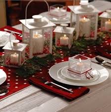 A christmas wedding table setting with an evergreen, pinecone and berry runner, thin candles, red napkins and mini wreaths for place settings. 60 Inspiring Winter And Christmas Theme Wedding Centerpieces