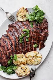 Grab a sharp knife and cut the steak into 1/4 inch slices, against the grain. Tender Grilled Flank Steak Easy Marinade Fit Foodie Finds