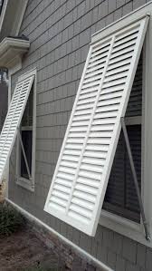 White Bahama Style Exterior Shutters By The Louver Shop Outdoor Shutters Shutters Exterior Bahama Shutters
