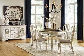 Rokane dining table and 8 chairs set. Realyn Extendable Dining Table Ashley Furniture Homestore