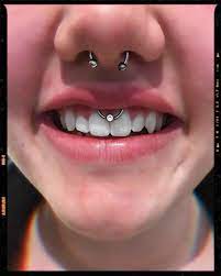 septum piercing and smiley piercing in 2021 smiley piercing face piercings septum piercing