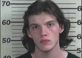 Body of missing north Alabama man found buried in yard; 2 friends charged  with murder