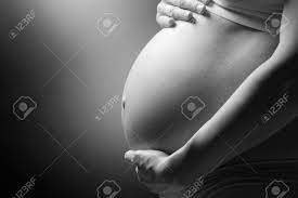 Pregnant woman wearing a white lace top. Pregnant Woman Belly Black And White Pregnant Tummy Closeup Stock Photo Picture And Royalty Free Image Image 35403220