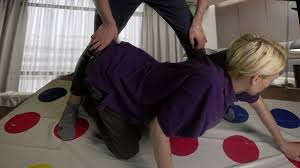 Twister (accidentally slipped his hand into his underpants)