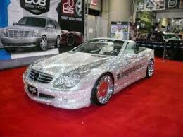 I Can T Believe It Sky High Prince Al Walid Bin Talal Owns A Handmade Mercedes Sl600 Car Made From Diamonds And Swar Car Bling Custom Mercedes Expensive Cars