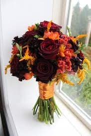 Grey bridesmaid dresses, white bridal gown, orange color wedding bouquets, champagne wedding sandals, woods direction boards, orange flower and woods, groom and groomsmen in navy blue suits. Pin By Ericka Campbell On One Day Wedding Red Bouquet Wedding Fall Wedding Bouquets Orange Wedding Bouquet