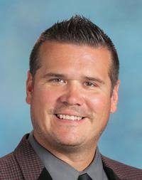 Long-time business teacher accepts new district position
