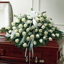 Flowers have the ability to make the ambiance soothing and lighten the mood of the mourners. White Roses Half Casket Cover Casket Flowers