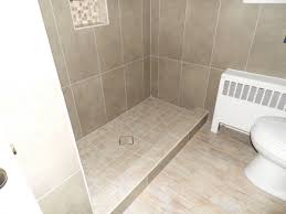 Another great bathroom tile idea is the penny tiles. Large Format Tile Small Bathroom Novocom Top