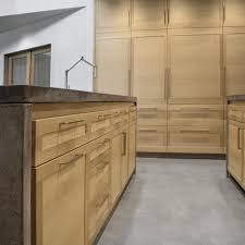 Especially those white melamine cabinets with the strip of oak on the bottom of each door. Photos Hgtv