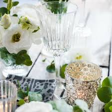 Whether you're planning an informal get together or a fancy dinner party, there are more than a few ways to get the job done and have a great time without spending a ton of money. How To Host A Dinner Party On A Budget With These Simple Tips