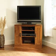 The most common corner tv cabinet material is wood. Corner Tv Stands For Flat Screens Homes By Ottoman Homes By Ottoman