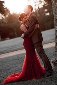 So, it's really no wonder that you're considering bringing this vibrant hue into your special day. Red Wedding Dresses