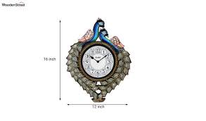 3d diy wall clocks 34 decorated wall clocks 18 nanny wall clocks 17 gold wall clocks 13 turkey wall clocks 13 silver wall clocks 11 black wall clocks 8 round coloured peacock wall clock. Buy Antique Handcrafted Peacock Decorative Wall Clock Online In India Wooden Street