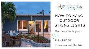 Outdoor string lights can be hung temporarily during events such as weddings or permanently to enhance the backyard patio. How To Hang Outdoor String Lights On Removable Poles Or Posts Youtube