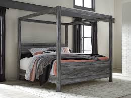 Some of our beds have no footboard; Baystorm Gray King Canopy Bed Ez Furniture Sales Leasing