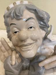 Porcelain Clown Head With Hands Statue