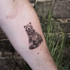 It is uncomplicated, with no shading, and fairly easy to reproduce. Bear Tattoo For Family Strength Perseverance Guide For 2021 Tattoo Stylist