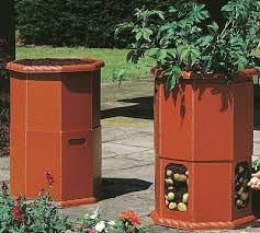 A bucket can also be placed on a patio or deck if you have limited room. Grow Potatoes In A Bucket Look At This Awesome Potato Bucket The Bottom Slides Up For Easy Access Growing Potatoes Potato Barrel Container Potatoes