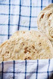 How To Make The Everyday Indian Flatbread Roti Chapati Traditional Indian Food Indian Bread Indian Food Recipes