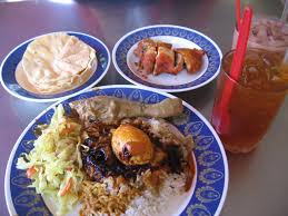 Nasi kandar has been the local's favourite for decades and still is regardless of skin colour and religion. Nasi Kandar Walk With Us