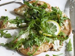 Ina S White Pizzas Ditch Delivery Pizza And Instead Opt For Ina Garten S Cheesy Pie Topped With A Bed Of Pep Arugula Recipes Food Network Recipes White Pizza