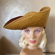 TANTALIZING GOLD STRAW HAT WITH FOLDED WIDE BRIM + FABRIC PURPLE FLOWERS