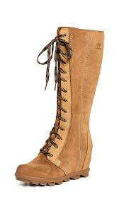 The classic silhouette or the fresh updated version of the luxe and cosy boot, find yours. Sorel Leather Joan Of Arctic Wedge Ii Tall Boot In Camel Brown Brown Lyst