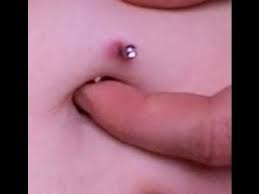 How To Take Care Of An Infected Belly Button Piercing Infected Belly Button Belly Button Piercing Belly Button Piercing Care
