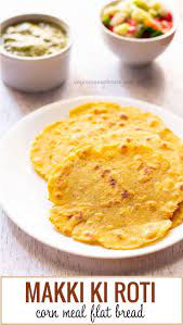 Makki Ki Roti Recipe With Detailed Step By Step Photos Makki Ki Roti Is Unleavened Flat Bread Made From Maize Flour Corn Roti Recipe Recipes Chapati Recipes