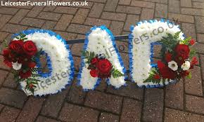 Created by one of our local florist partners that are located near you, the freshest flowers will be used which include white roses, white lilies, white mums, white carnations, monte casino and more all created in the shape of a wreath. Leicester Florist On Twitter Dad Named Letter Floral Tribute Dad In White Red Roses Flowers With Blue Ribbon Visit Https T Co Hx6t5hj29w 07951526788 Funeralletter Leicesterflorist Funeralflowers Leicesterfuneralflowers Leicestershire