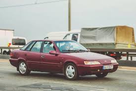 Image result for Jamaica Yellow 1990 Daewoo