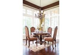 This opulent chair has elegantly ornamented curved cabriole legs, decorated arm rests, a pierced back splat, and rich chenille brocade upholstery on the wide. North Shore Table And Base Ashley Furniture Homestore