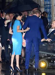 Ahead of quitting royal duties on march 31, prince harry and meghan markle were snapped attending to an official engagement on march 5 (thursday) and the dreamy photos have been making netizens lose sleep. Prince Harry And Meghan Markle S Breathtaking Umbrella Photo Daily Mail Online