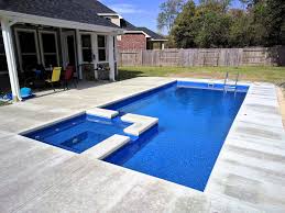 The Limitless 30 Is One Of Leisure Pools Newest Composite Fiberglass Swimming Pools But Is Sure To Swimming Pool Designs Pool Designs Pool Landscape Design