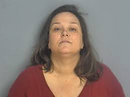 Woman charged with murder says she tried to cut victim 'in half' with car,  police say