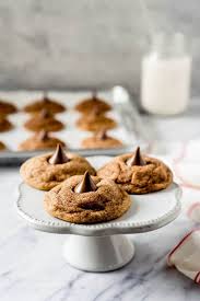 The dough is so firm and nice to work with and is so wonderful smelling that it is almost like a stress reliever. Easy Snickerdoodle Hershey Kiss Cookies Noshing With The Nolands