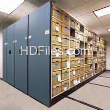 Take a row of stationary lateral shelves, and. Ships Wheel Rolling Shelving Moving Filing Cabinets That Are Sliding With Steering Wheels To Slide File Shelves Over To Access Mover Aisle For Access Innovative Storage Solutions