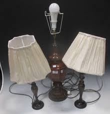 Both practical and decorative, table lamps are an easy and stylish way to layer the light in any space. A Modern Antiqued Bronze Finish Table Lamp Pair Of Patinated Metal Candlestick Table Lamps A In Cheffins Fine Art