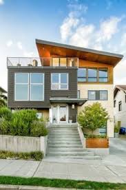 Renovation D Une Maison Traditionnelle De Seatle En Jolie Maison Contemporaine Facade House Architecture Design House Exterior