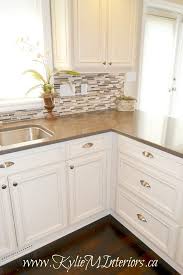 Oak Kitchen Remodel Painted Cream Cabinets And Quartz Oak Kitchen Remodel Kitchen Remodel Small Kitchen Renovation